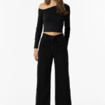ean noir Tiffosi pour ado fille, du XXS au L. Taille haute, coupe large, 100% coton. Fermeture zip et bouton métallique. Style tendance